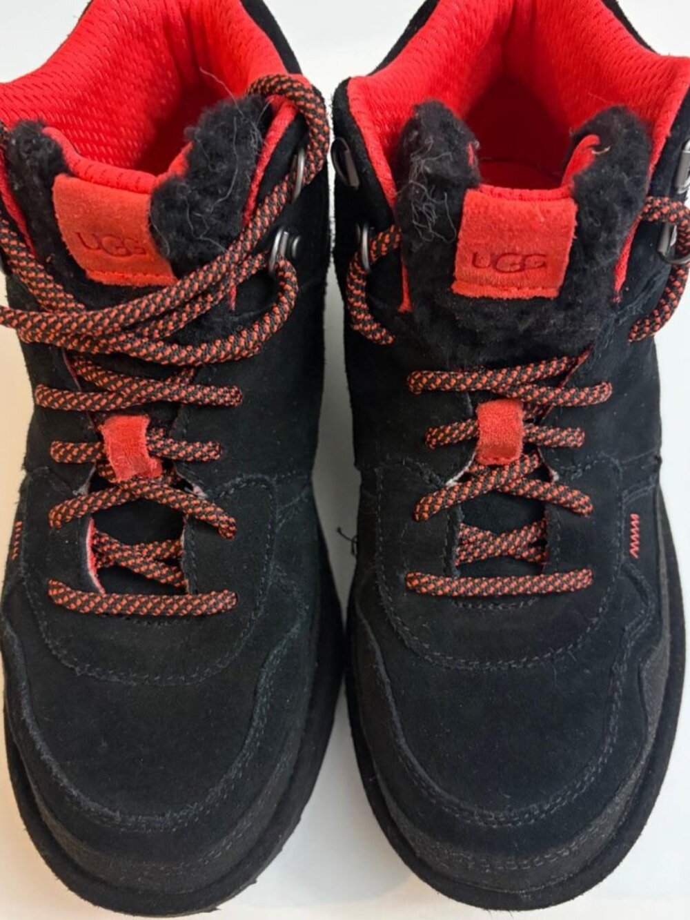 UGG Kids Highland Hi Heritage Sneaker - Black/Red. Used but in excellent shape.